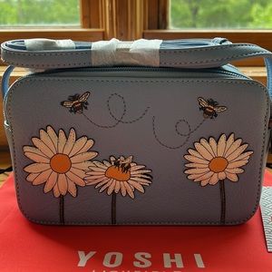 Yoshi Lichfield blue leather crossbody bag with appliqué bees and daisies